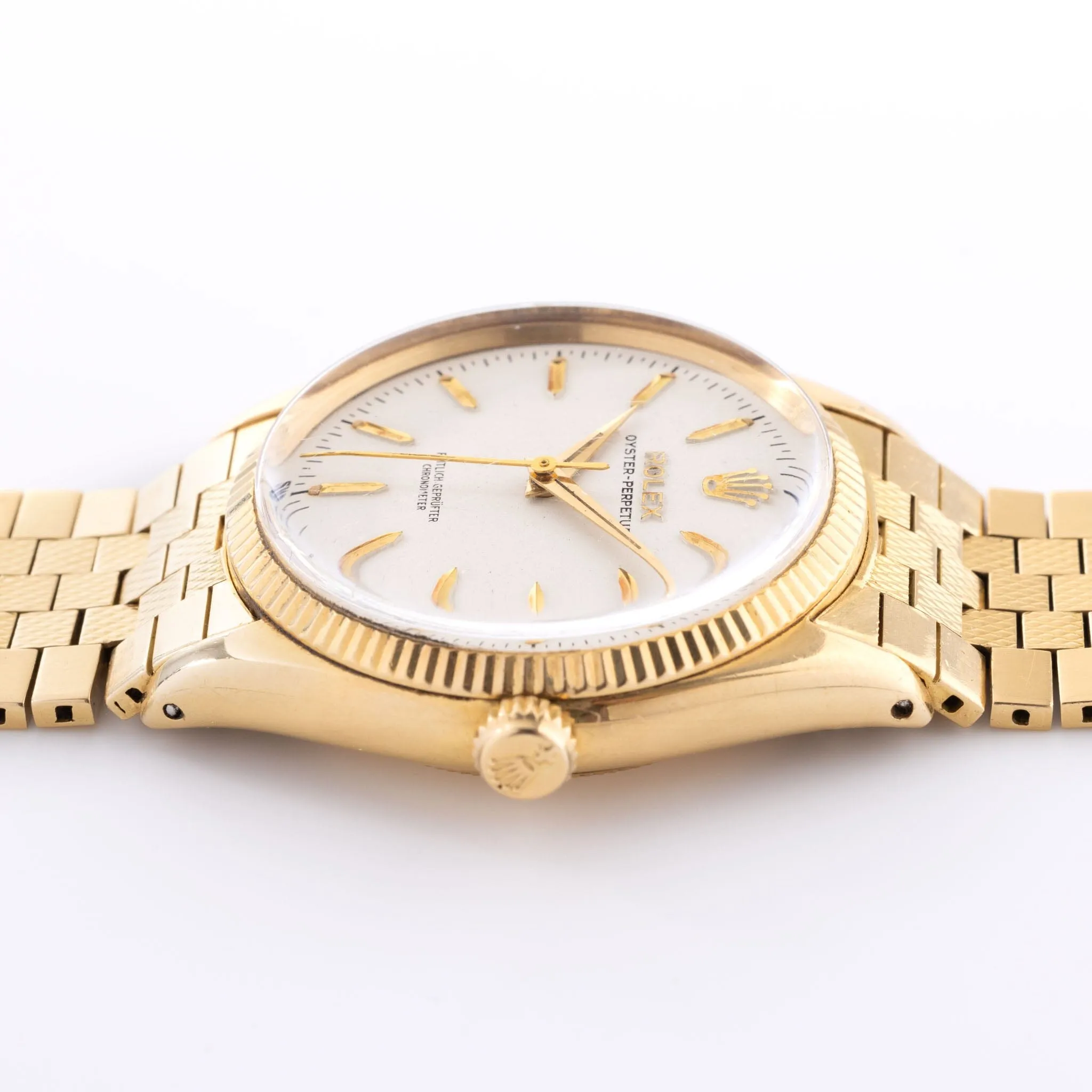 Rolex Oyster Perpetual 18kt Gold German Dial Brick Bracelet ref 6567